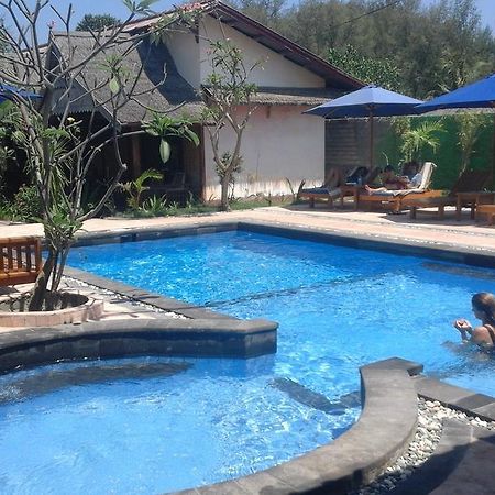Coral Beach Pizza Cottages กีลีตราวางัน ภายนอก รูปภาพ