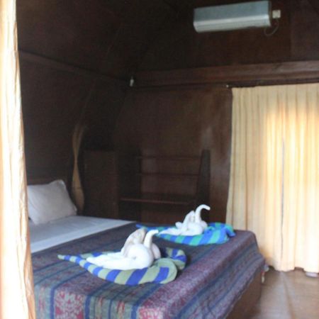 Coral Beach Pizza Cottages กีลีตราวางัน ภายนอก รูปภาพ