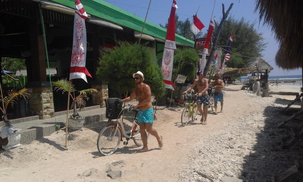 Coral Beach Pizza Cottages กีลีตราวางัน ภายนอก รูปภาพ