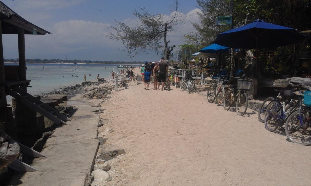 Coral Beach Pizza Cottages กีลีตราวางัน ภายนอก รูปภาพ