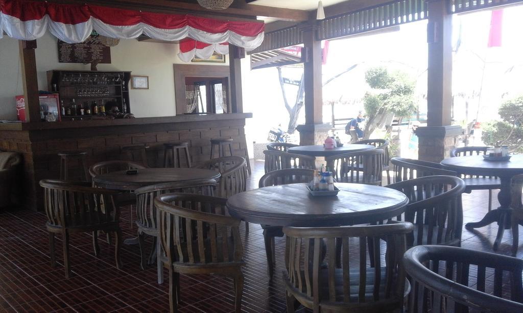 Coral Beach Pizza Cottages กีลีตราวางัน ภายนอก รูปภาพ