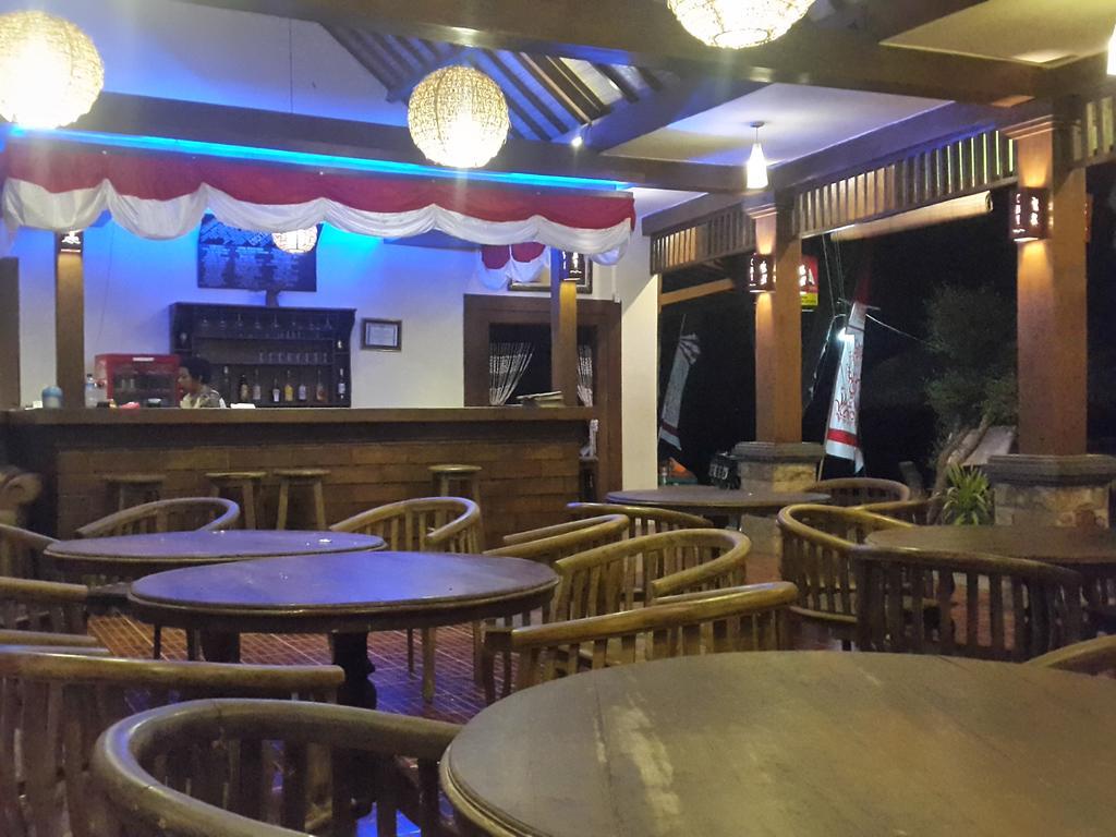 Coral Beach Pizza Cottages กีลีตราวางัน ภายนอก รูปภาพ