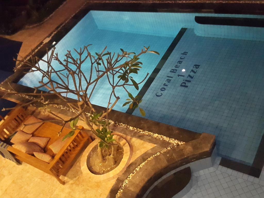 Coral Beach Pizza Cottages กีลีตราวางัน ภายนอก รูปภาพ