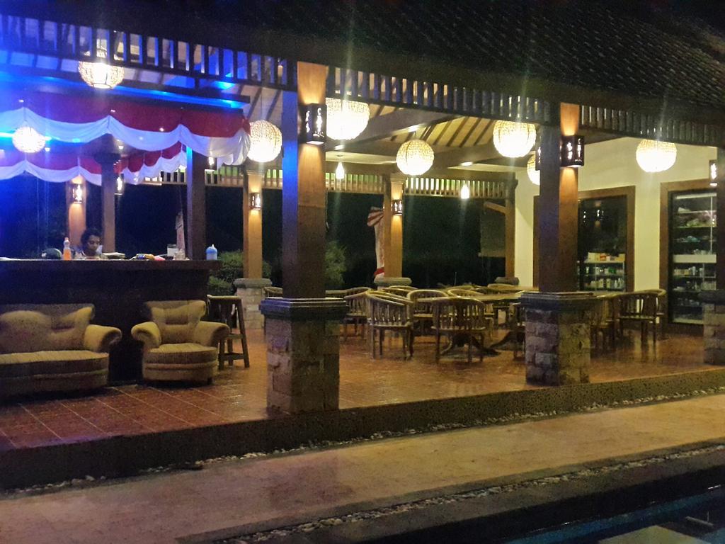 Coral Beach Pizza Cottages กีลีตราวางัน ภายนอก รูปภาพ