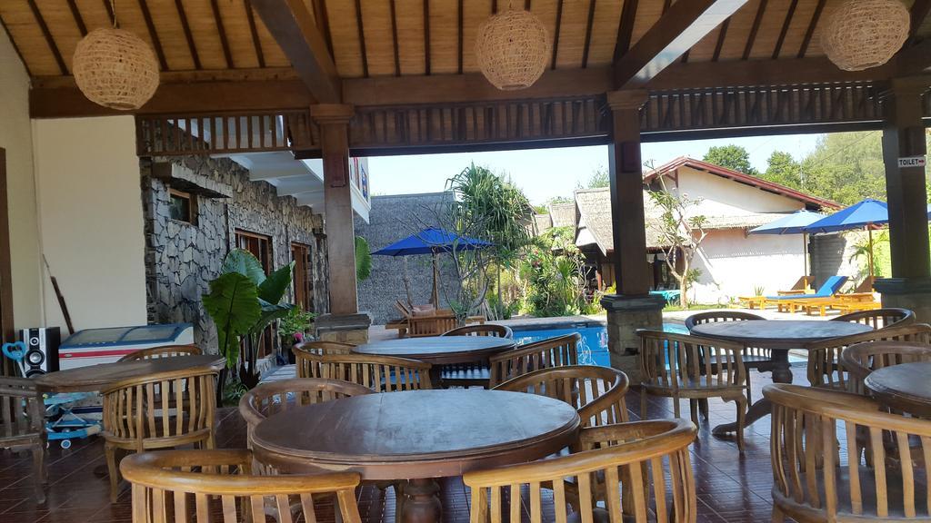 Coral Beach Pizza Cottages กีลีตราวางัน ภายนอก รูปภาพ