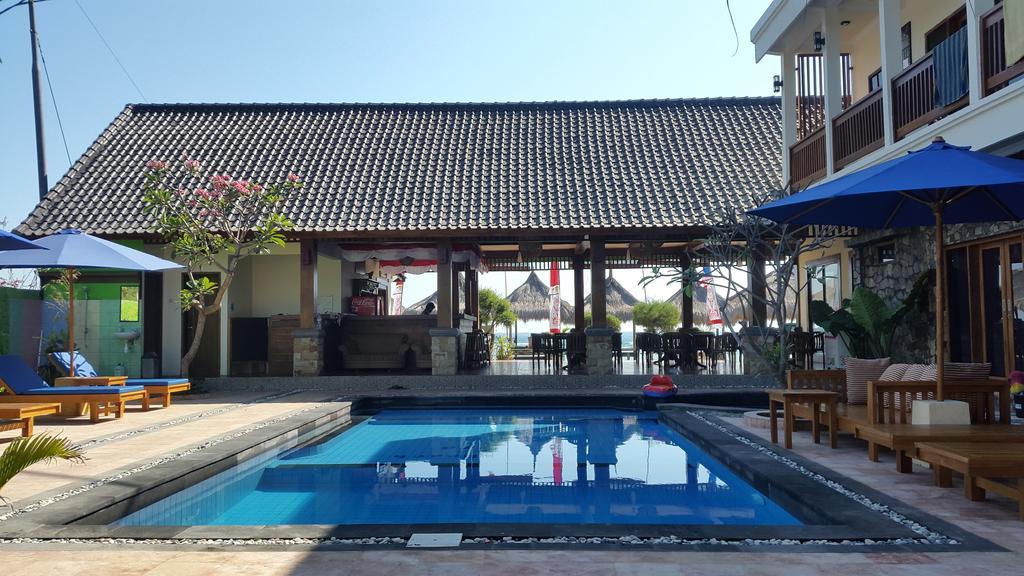 Coral Beach Pizza Cottages กีลีตราวางัน ภายนอก รูปภาพ
