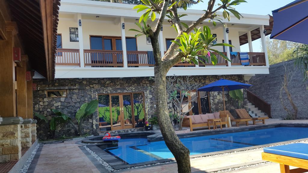 Coral Beach Pizza Cottages กีลีตราวางัน ภายนอก รูปภาพ