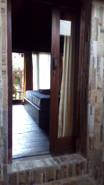 Coral Beach Pizza Cottages กีลีตราวางัน ภายนอก รูปภาพ