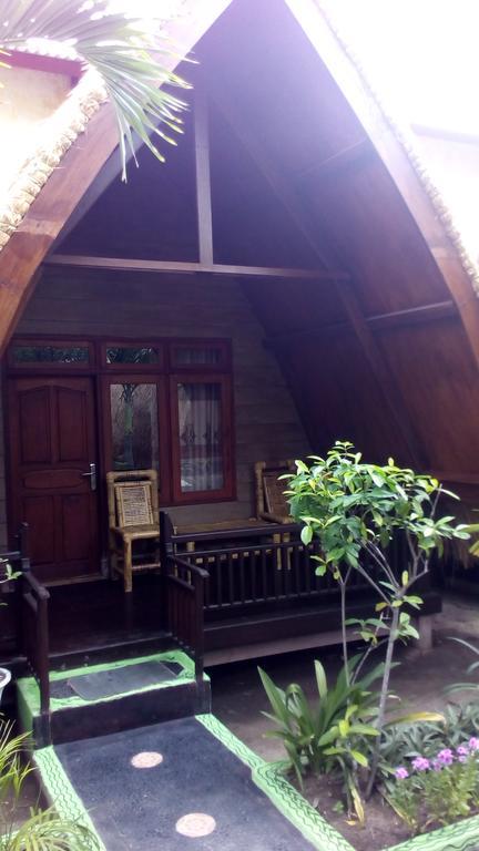 Coral Beach Pizza Cottages กีลีตราวางัน ภายนอก รูปภาพ