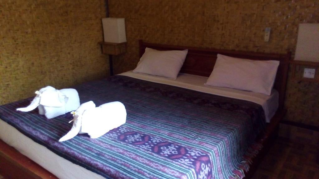Coral Beach Pizza Cottages กีลีตราวางัน ภายนอก รูปภาพ