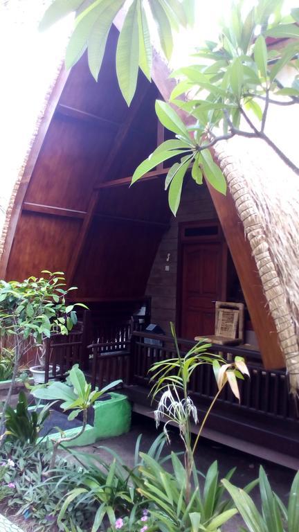 Coral Beach Pizza Cottages กีลีตราวางัน ภายนอก รูปภาพ