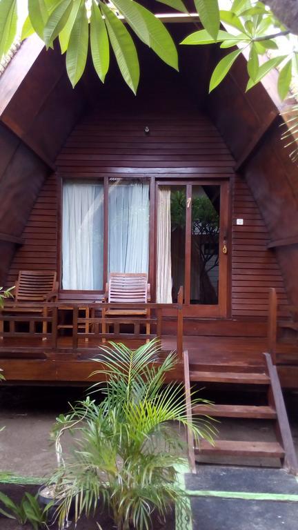 Coral Beach Pizza Cottages กีลีตราวางัน ภายนอก รูปภาพ