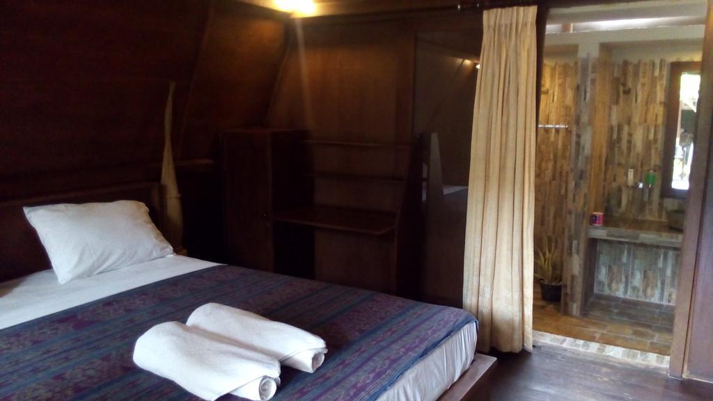 Coral Beach Pizza Cottages กีลีตราวางัน ภายนอก รูปภาพ