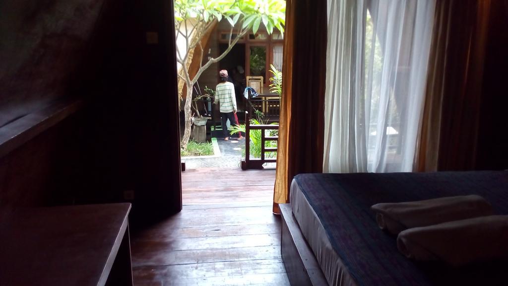 Coral Beach Pizza Cottages กีลีตราวางัน ภายนอก รูปภาพ