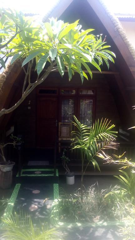 Coral Beach Pizza Cottages กีลีตราวางัน ภายนอก รูปภาพ