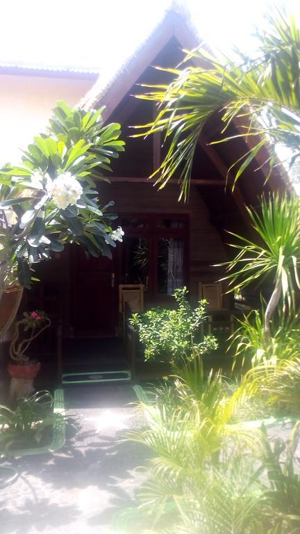 Coral Beach Pizza Cottages กีลีตราวางัน ภายนอก รูปภาพ