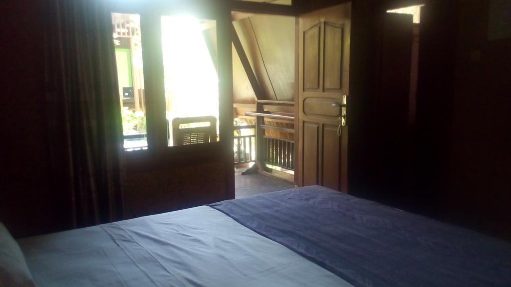 Coral Beach Pizza Cottages กีลีตราวางัน ภายนอก รูปภาพ