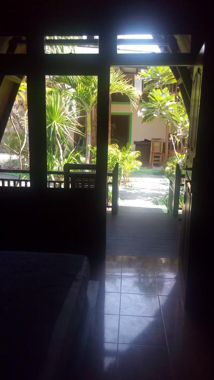 Coral Beach Pizza Cottages กีลีตราวางัน ภายนอก รูปภาพ