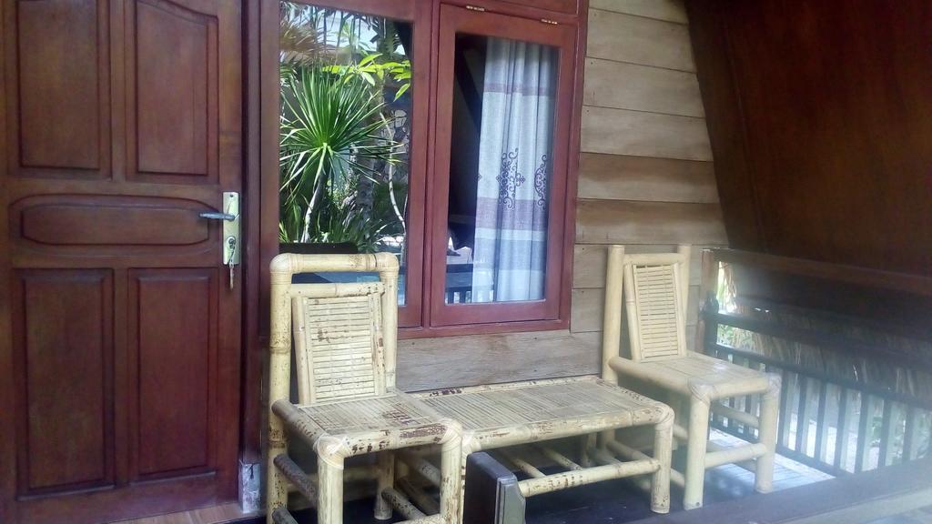 Coral Beach Pizza Cottages กีลีตราวางัน ภายนอก รูปภาพ