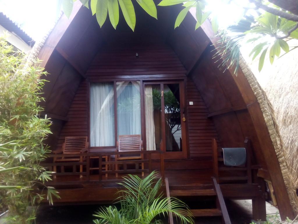 Coral Beach Pizza Cottages กีลีตราวางัน ภายนอก รูปภาพ