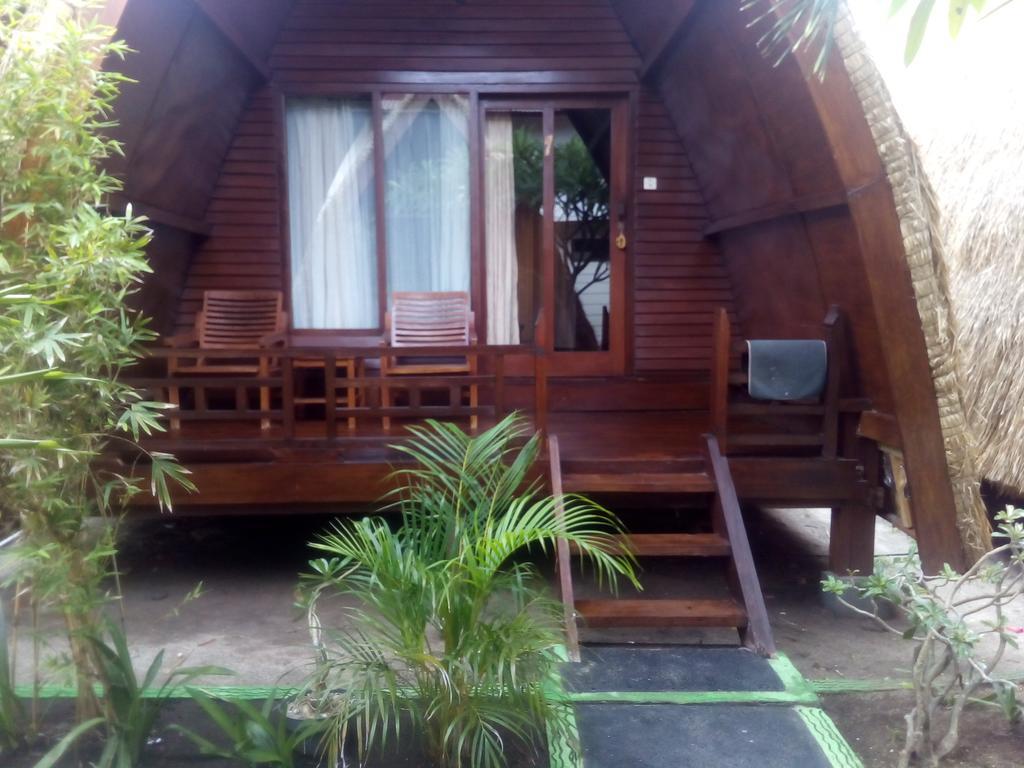 Coral Beach Pizza Cottages กีลีตราวางัน ภายนอก รูปภาพ