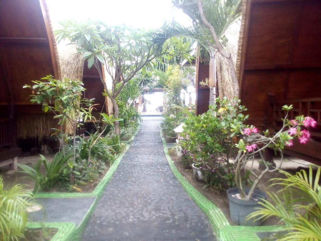 Coral Beach Pizza Cottages กีลีตราวางัน ภายนอก รูปภาพ