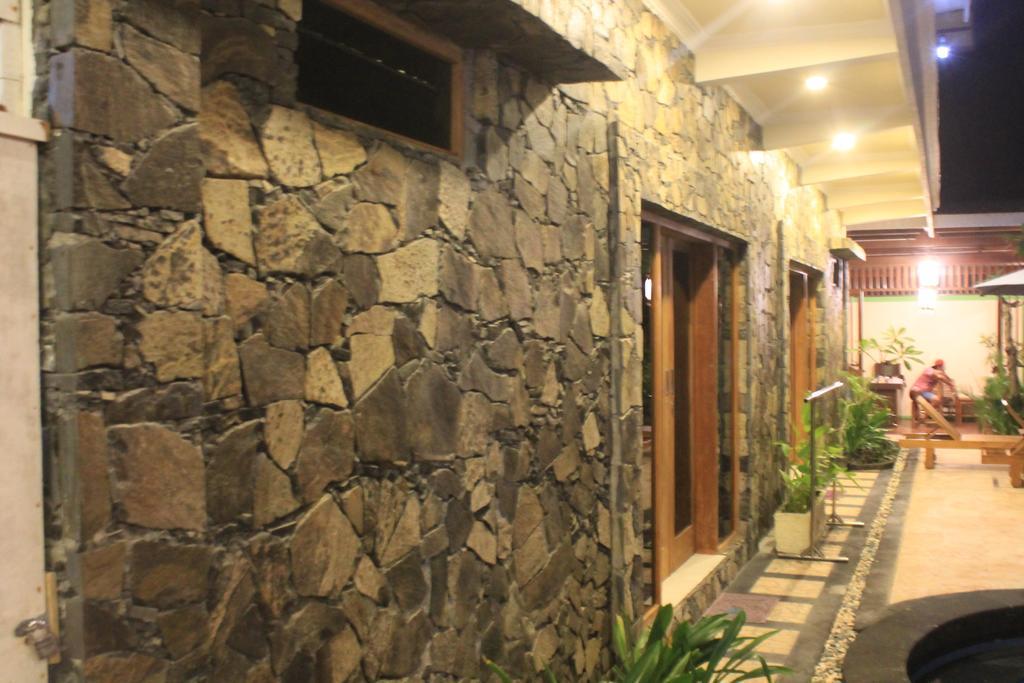 Coral Beach Pizza Cottages กีลีตราวางัน ภายนอก รูปภาพ