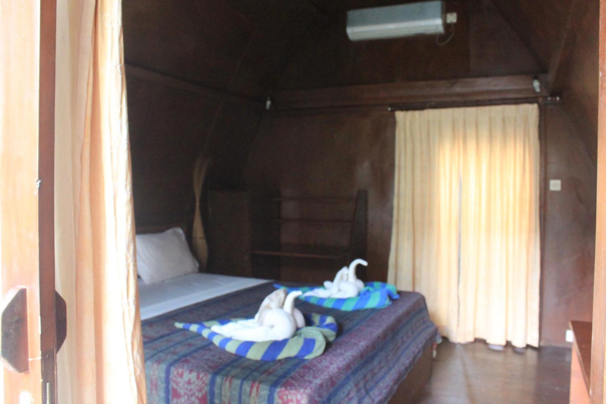 Coral Beach Pizza Cottages กีลีตราวางัน ภายนอก รูปภาพ
