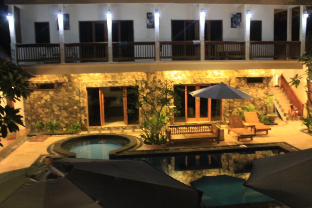 Coral Beach Pizza Cottages กีลีตราวางัน ภายนอก รูปภาพ