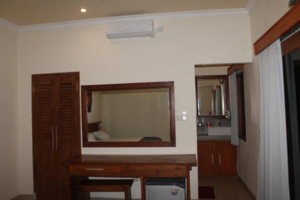 Coral Beach Pizza Cottages กีลีตราวางัน ภายนอก รูปภาพ
