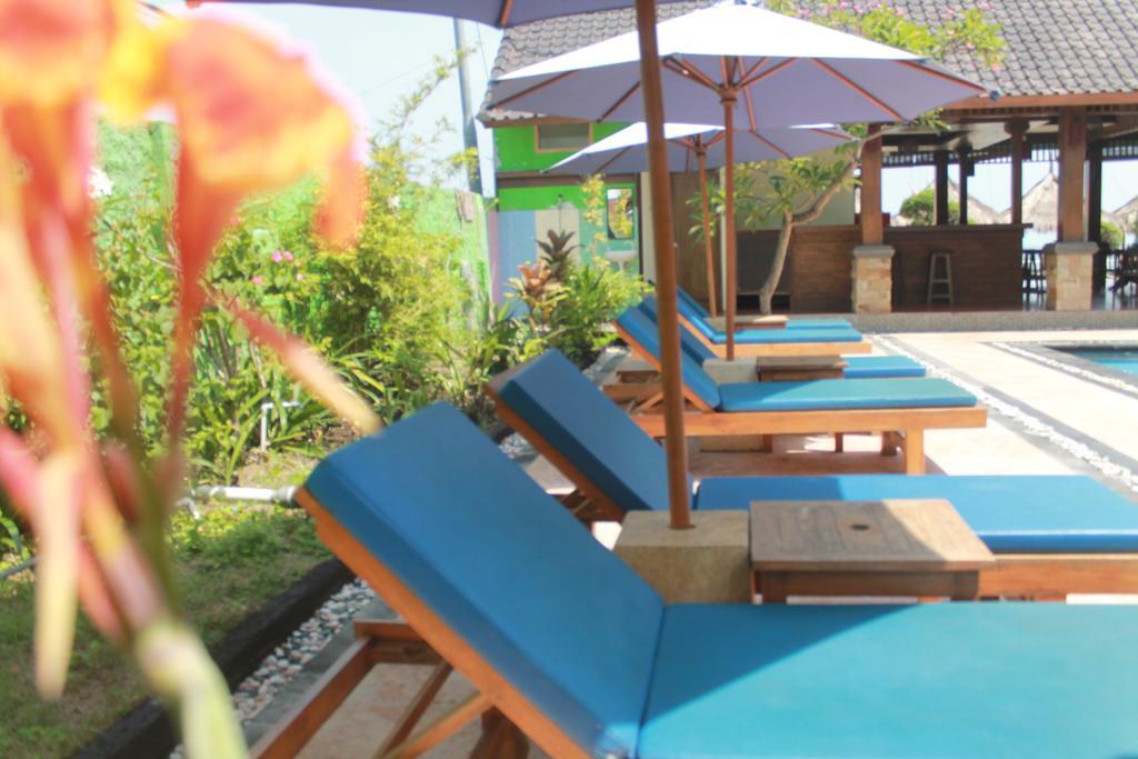 Coral Beach Pizza Cottages กีลีตราวางัน ภายนอก รูปภาพ