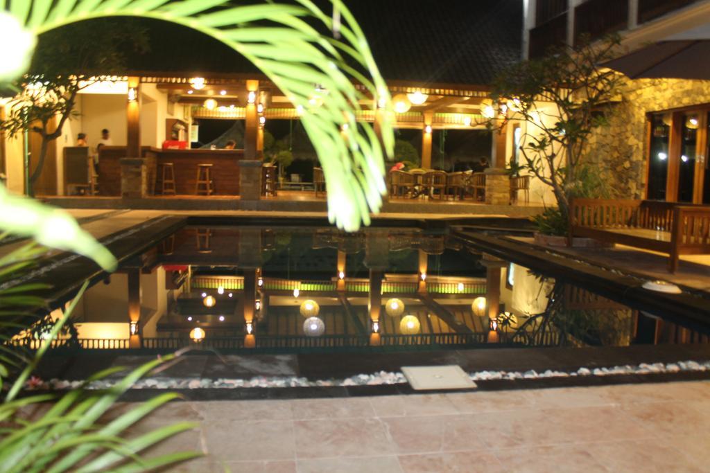 Coral Beach Pizza Cottages กีลีตราวางัน ภายนอก รูปภาพ