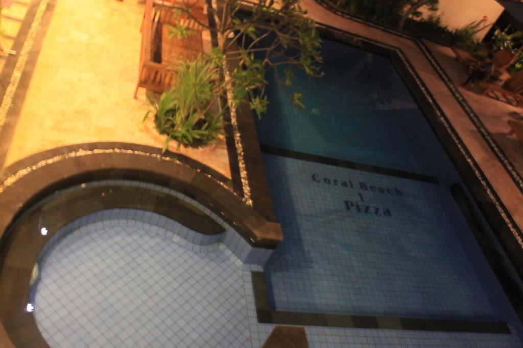 Coral Beach Pizza Cottages กีลีตราวางัน ภายนอก รูปภาพ