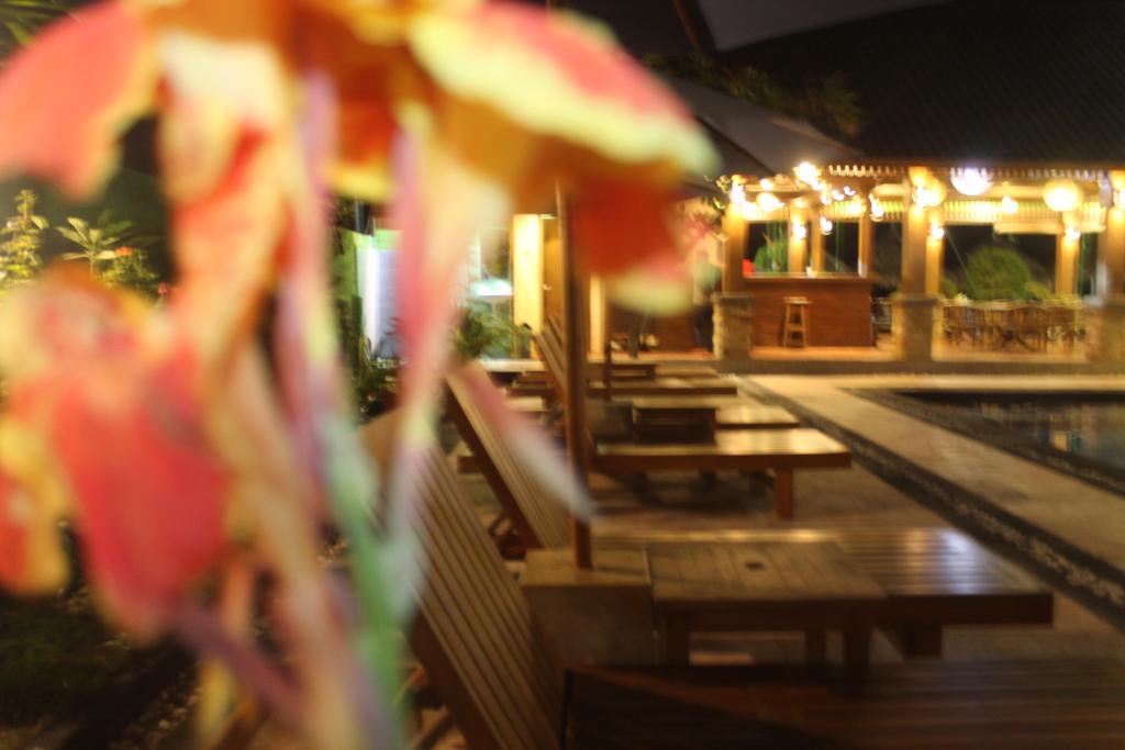Coral Beach Pizza Cottages กีลีตราวางัน ภายนอก รูปภาพ