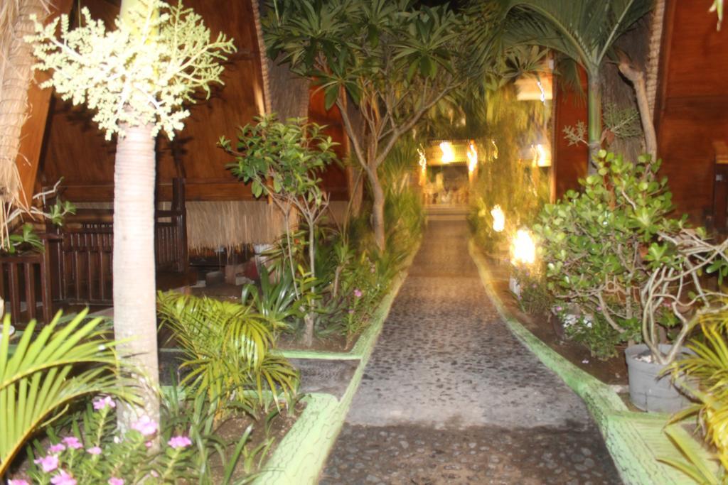 Coral Beach Pizza Cottages กีลีตราวางัน ภายนอก รูปภาพ
