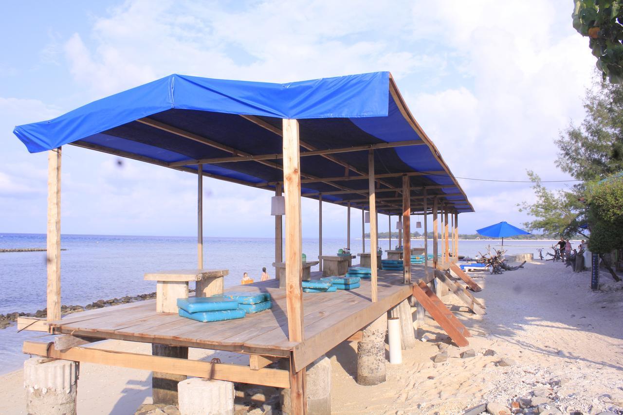 Coral Beach Pizza Cottages กีลีตราวางัน ภายนอก รูปภาพ