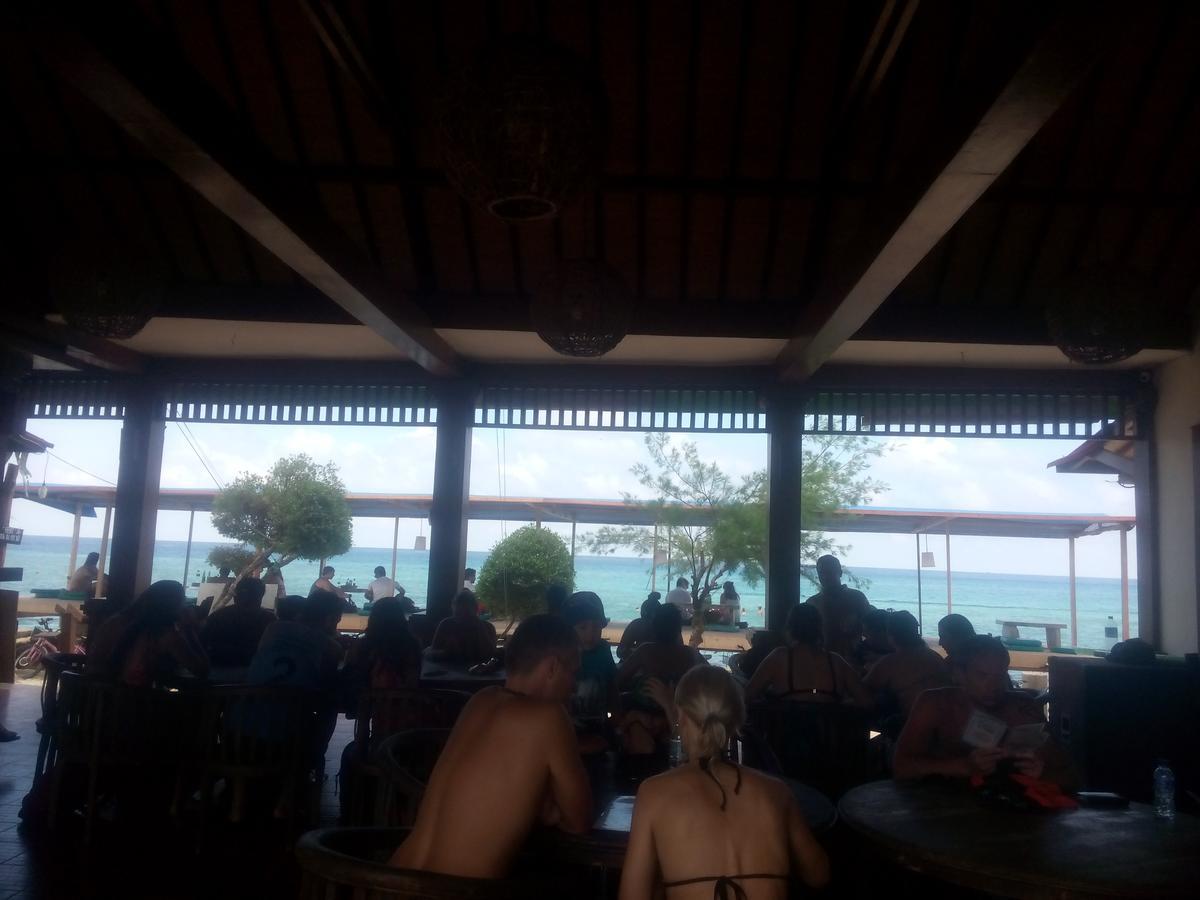 Coral Beach Pizza Cottages กีลีตราวางัน ภายนอก รูปภาพ
